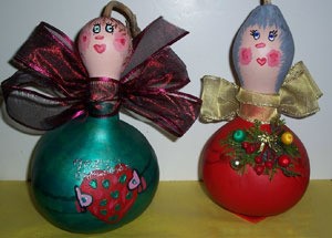 two beautifully painted gourd angels