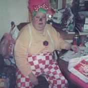 A woman dressed up as a clown.
