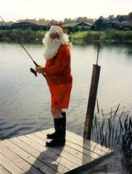 Santa on a dock fishing.