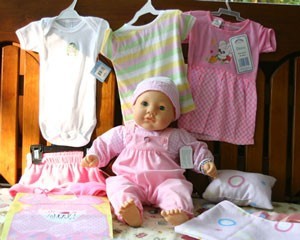 Doll with clothing.