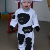 toddler in cow costume