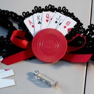 Poker hand pin.