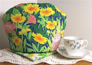 bright yellow flowered tea cozy and hot pad