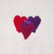 3 crochet hearts