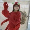 Girl wearing a hermit crab costume.
