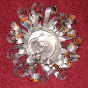 A decorative ornament made from a soda can.