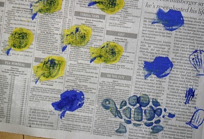 sea life stamped on newspaper