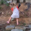 Little girl shoveling