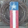 Flag Painted Shutters - finished shutters in front of a natural twig wreath
