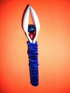 Instrument made from plastic spoons and jingle bells.