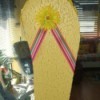 yellow decorative flip flop made from ceiling tile