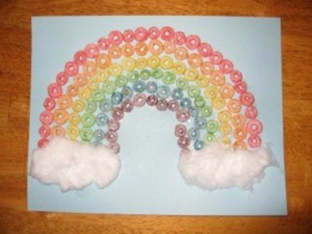 Cereal rainbow with cotton ball clouds.