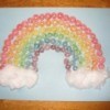 Cereal rainbow with cotton ball clouds.
