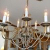 Chandelier hung with beads.