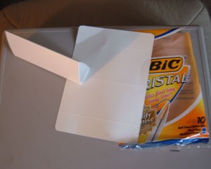 Cardboard pyramid from Bic pen package.