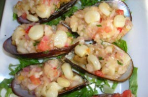 A Peruvian mussel dish inside the mussel shells.