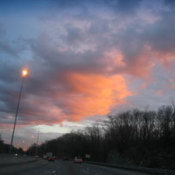 Orange cast on grey clouds.
