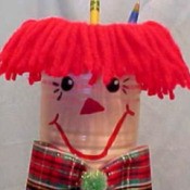 Raggedy Andy pencil holder.