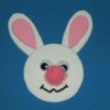Bunny magnet with pink pom pom nose.