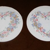 Round coasters with heart shaped flower pattern.