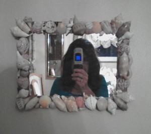 Mirror decorated with shells.