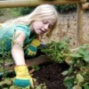 Young girl gardening.