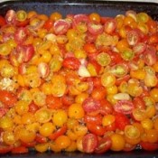 Pan of red and yellow cherry tomatoes.