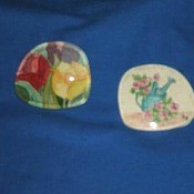 Gardening and flower motif painting glued on lens.