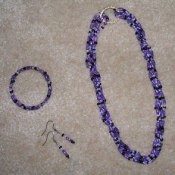 Blue bracelet, necklace, and earrings.