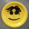 Smiley face paper plate.