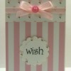 pink and white striped card
