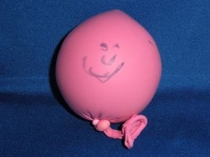 Pink balloon stress ball.
