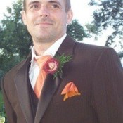 Groom with butterfly on his jacket