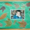 two photo placemats with fall leaves