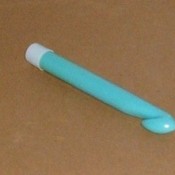 Crochet hook with a cap on non-hook end