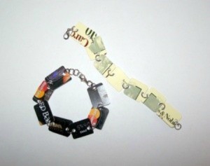 A bracelet made from parts of recycled gift cards.