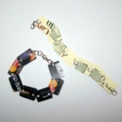 A bracelet made from parts of recycled gift cards.
