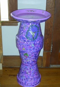 Tera cotta birdbath.