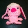 Pink crocheted amigurumi Easter bunny.