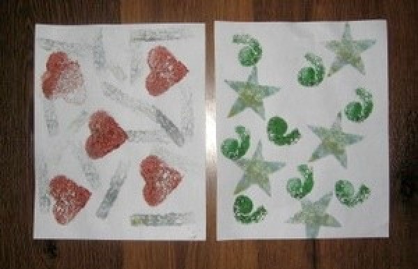Paper with sponge stamped art.