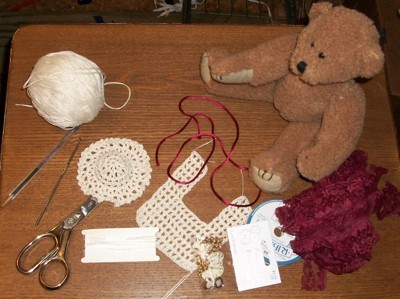 Teddy bear with crochet bib.