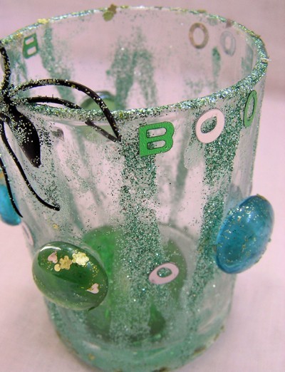 A spooky decorated glass for Halloween.