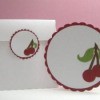Round card and tag with cherry motif.