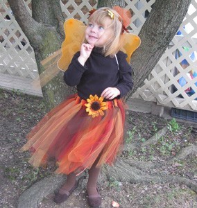 little girl wearing the costume