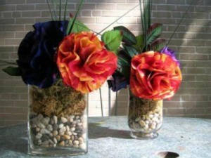 Coffee filter flowers in stone filled vases