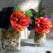 Coffee filter flowers in stone filled vases