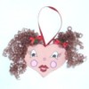 finished heart-faced Christmas ornament