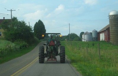 Tractor in road.