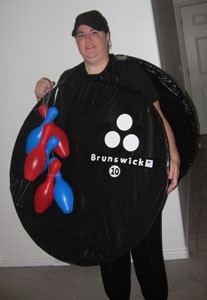 Woman dressed as a bowling ball.