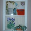 Decorated and painted old window wall hanging.